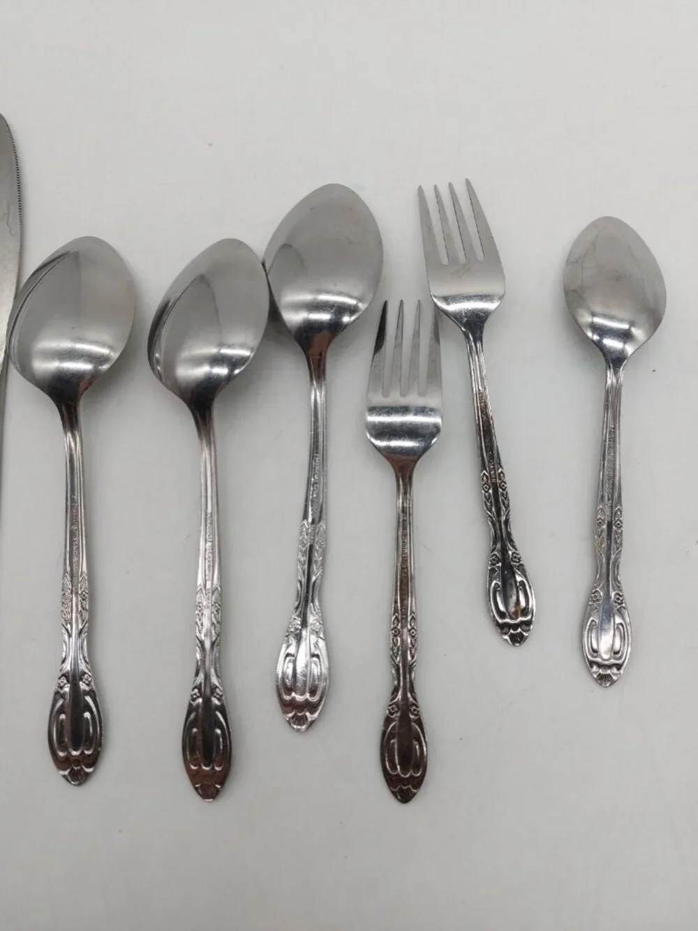 Northland Korea Stainless Flatware w Roses Spoons Knives Forks Lot Of 9